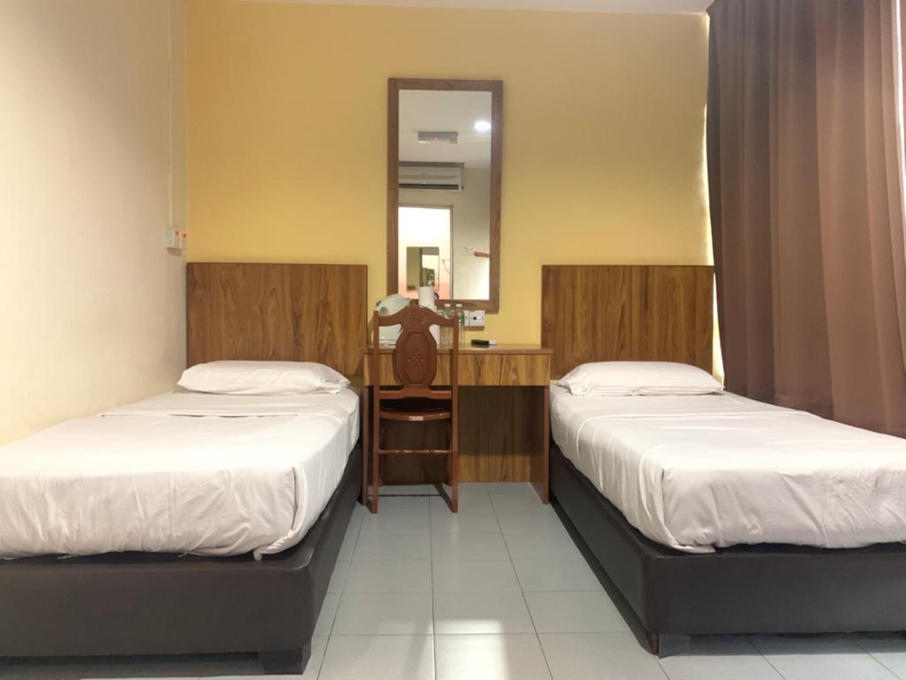 Oyo 89877 Sun Triang Hotel Kampong Kerayong Extérieur photo