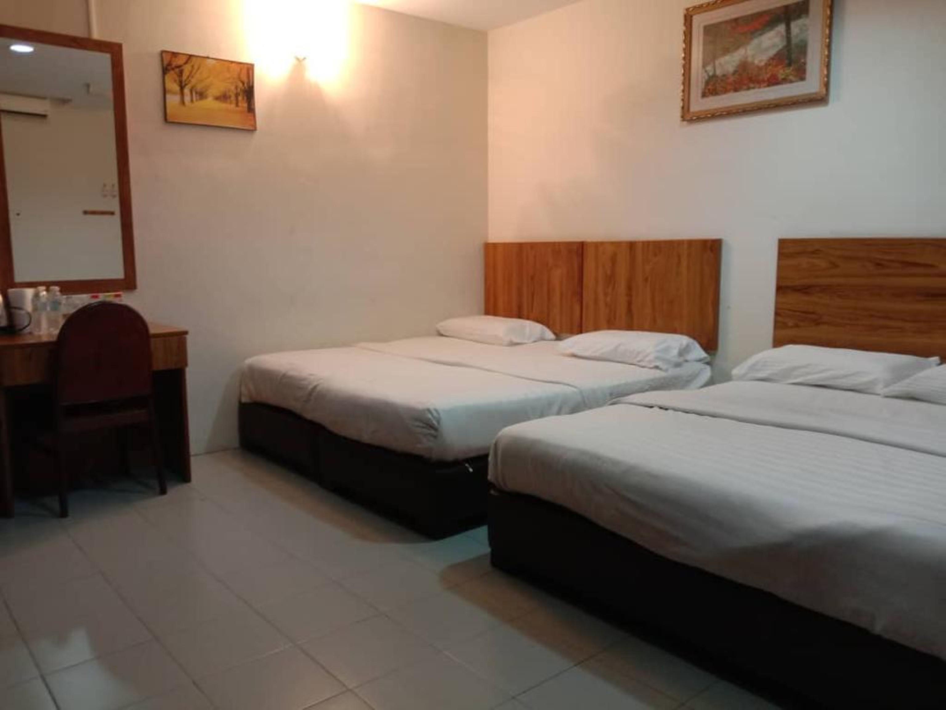 Oyo 89877 Sun Triang Hotel Kampong Kerayong Extérieur photo