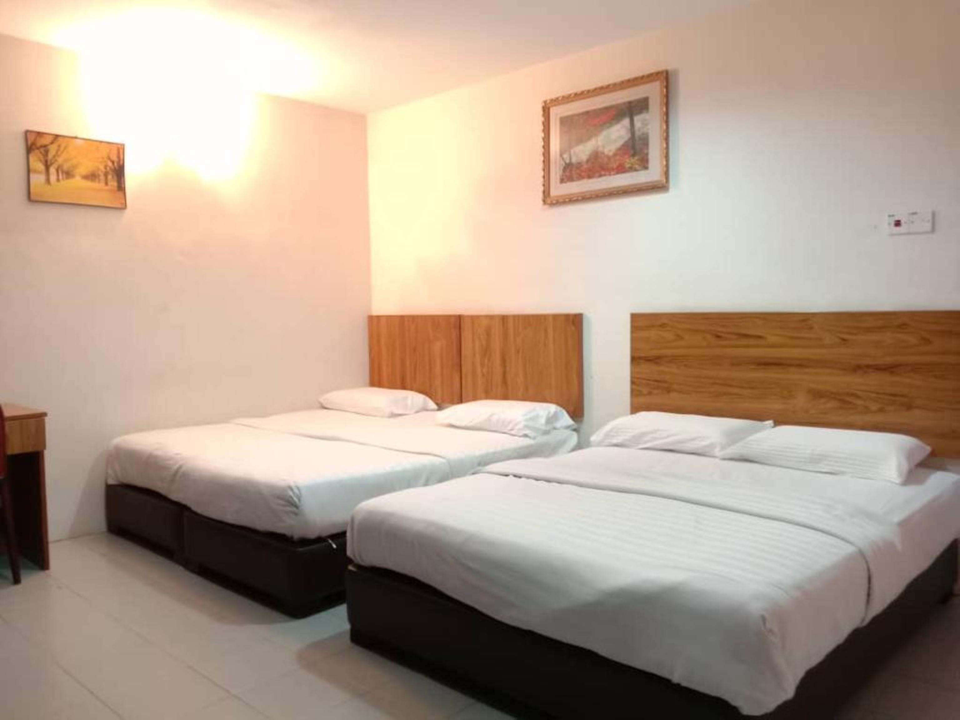 Oyo 89877 Sun Triang Hotel Kampong Kerayong Extérieur photo